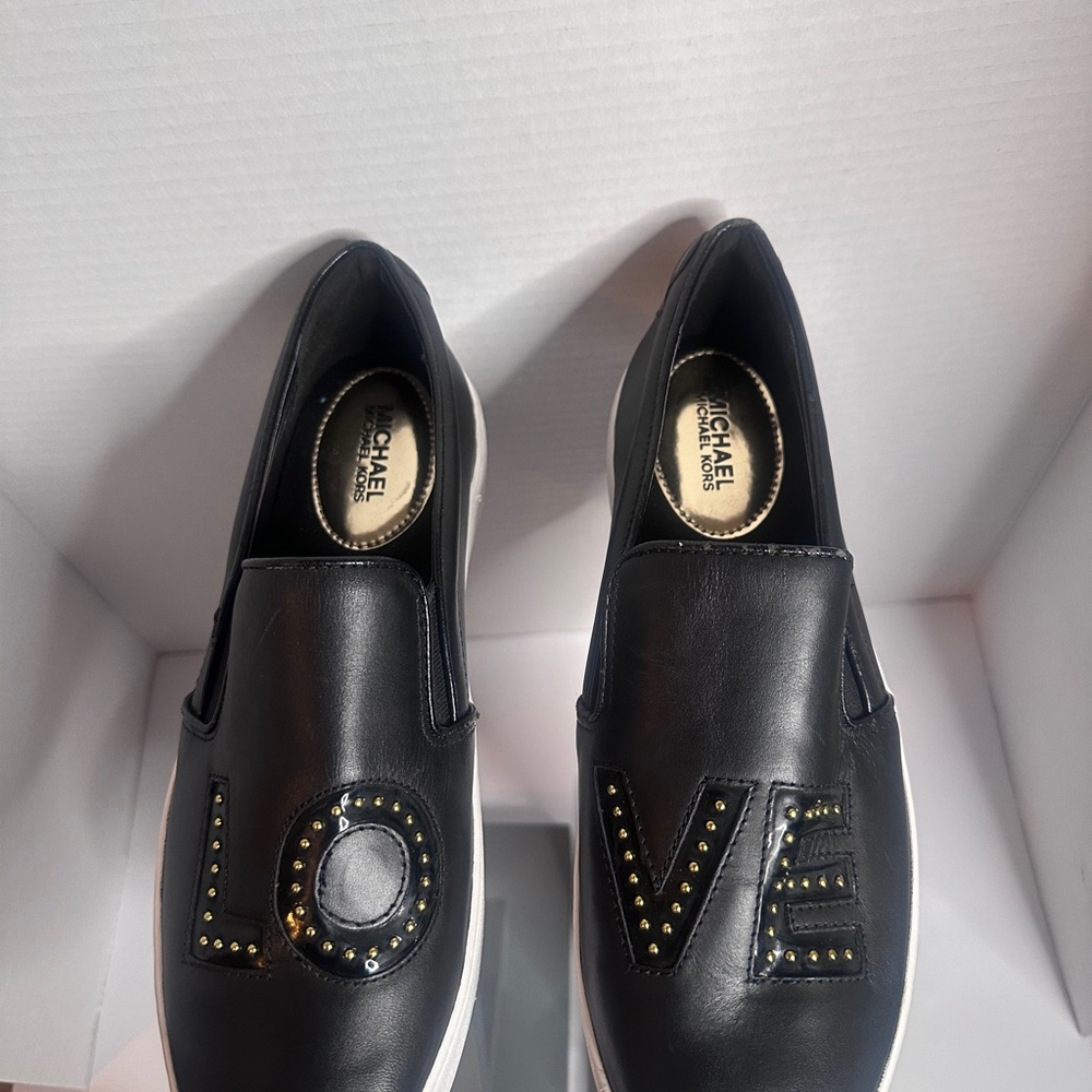 MICHAEL Michael Kors Black Slip-On Shoes with Gold Accents - Picture 2 of 7